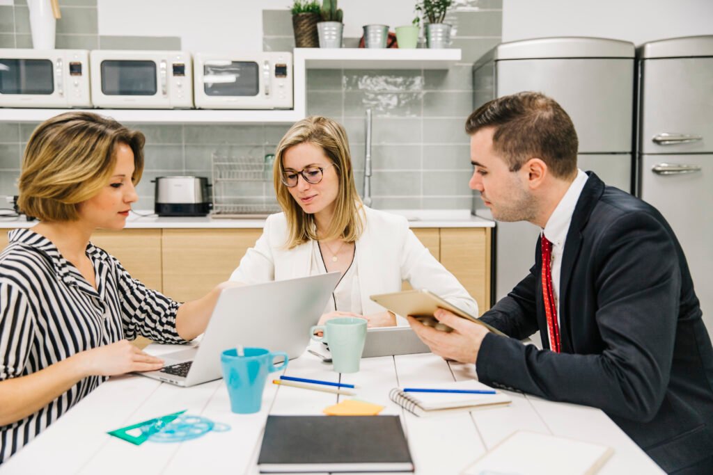 Real estate attorney discussing property documents during a free consultation with client.